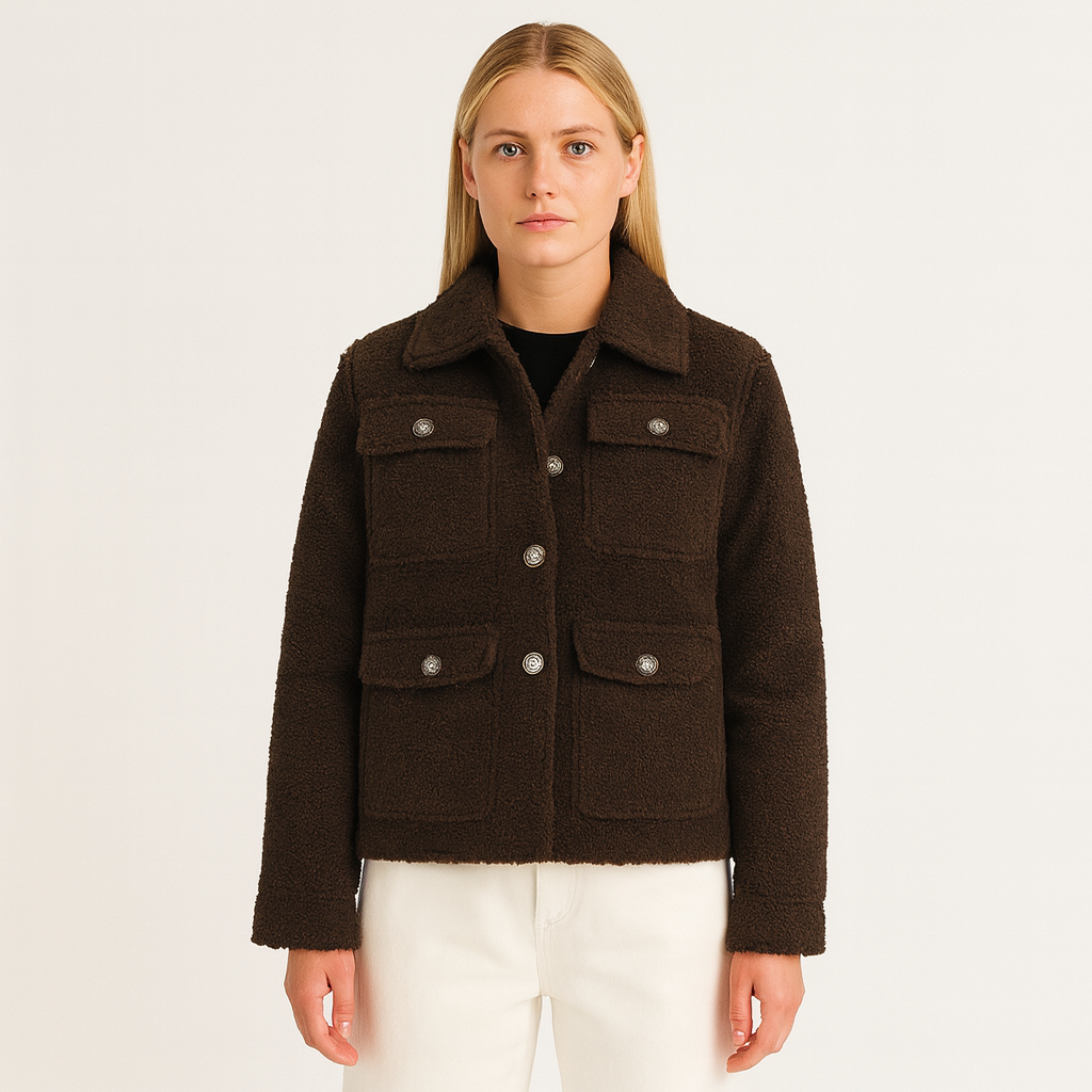 A short, textured jacket with a lapel collar, button-down front, long sleeves, and four front flap pockets.