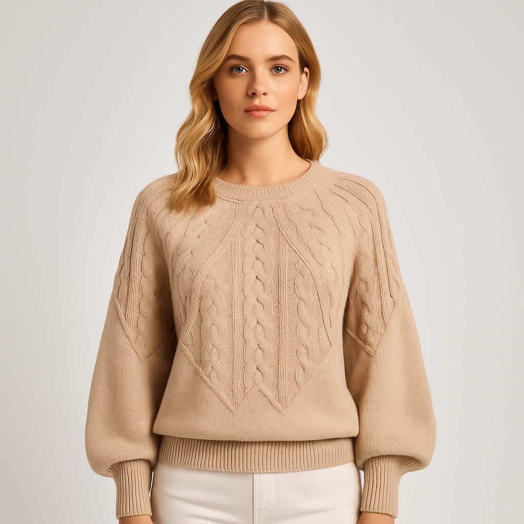 Knit cable sweater with textured detailing and relaxed fit, styled with a casual modern look