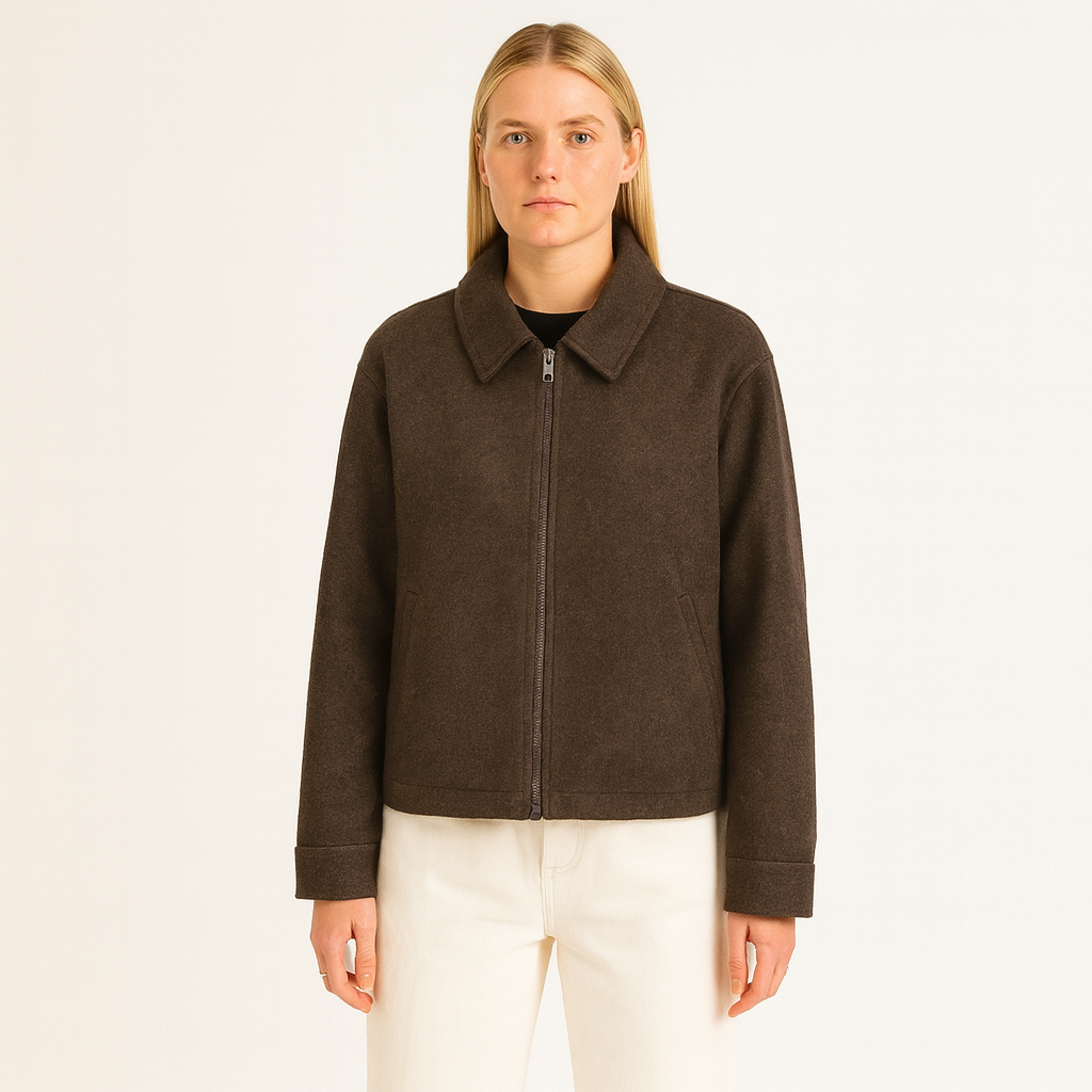 A short wool-blend jacket with a lapel collar, zip-up front, long sleeves, and a straight hem.